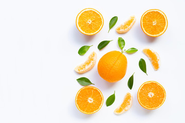 High vitamin C. Fresh orange citrus fruit with leaves isolated on white background.