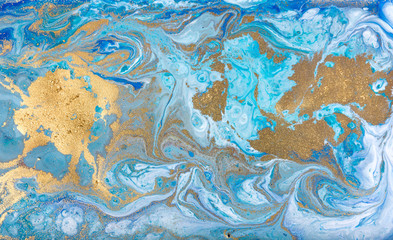 Fototapeta na wymiar Blue marbling pattern. Golden marble liquid texture.