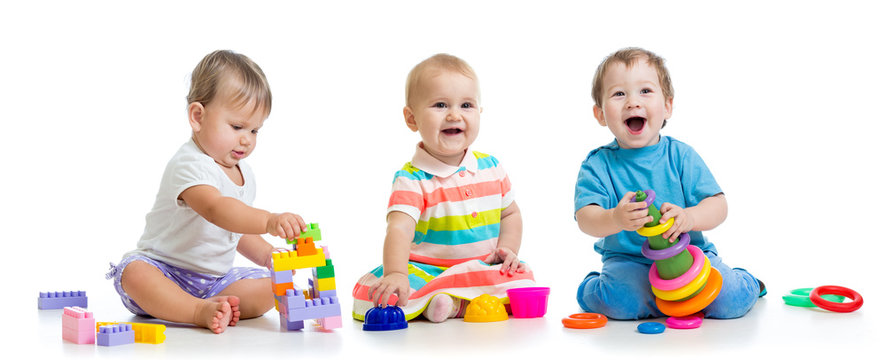 nursery babies play with educational toys, isolated on white
