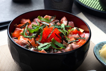 Salmon Don a bowl of rice with sashimi on top