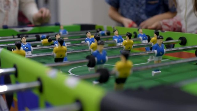 Closeup photo of plastic players in table football game