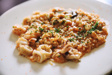 Seafood Risotto , traditional italian rice on table