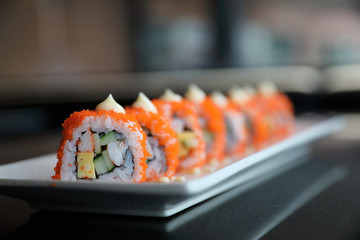 california roll sushi , rice roll with egg avocado egg and fish japanese food