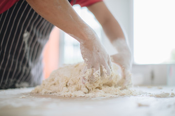 Making Handmade Noodles on wood background