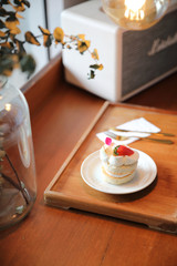 Strawberry cake dessert on wood table