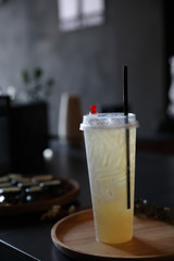 Lemon juice in black background