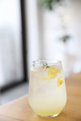 Lemonade or mojito cocktail with lemon and mint, cold refreshing drink or beverage with ice
