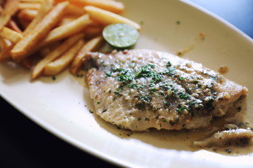 Halibut fillet steak with chips