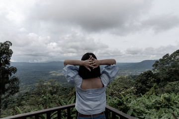 Young cute Asian Japanese girl hipster backpack women travelling looking at beautiful sky mountains scenery views 