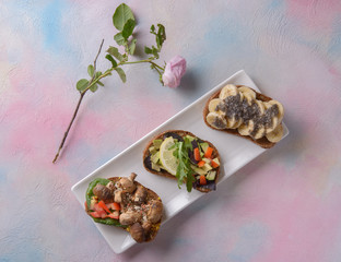 Vegan bruschetta and flower on the table