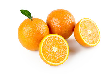 Fototapeta na wymiar Composition of two oranges with leaf and half orange fruit isolated on white background with clipping path. Perfectly retouched. ready-to-use food images.