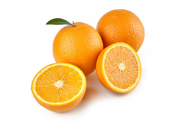 Orange fruit with leaf and half of orange isolated on white background with clipping path. Perfectly retouched. ready-to-use food images. Pack shoot