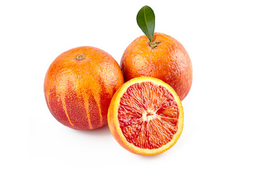 package design element. Red sicilian orange with half isolated on white background with clipping path. Perfectly retouched. ready-to-use food images. Pack shoot. Red blood orange