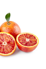 package design element. Red sicilian orange with half isolated on white background with clipping path. Perfectly retouched. ready-to-use food images. Pack shoot. Red blood orange