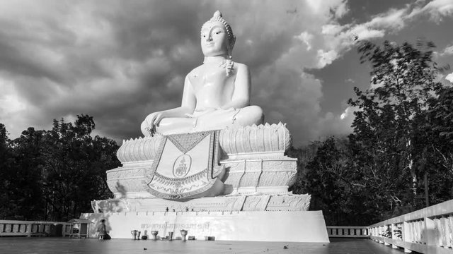  timelapse of the Wat Phra That Mae Yen big Buddha in Pai, Thailand with dramatic cloudy sky