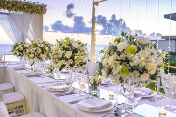Table setting at a luxury wedding and Beautiful flowers on the table. - 271372882