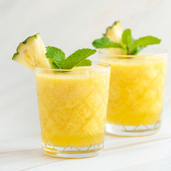 Refreshing healthy pineapple fruit smoothie drinks
