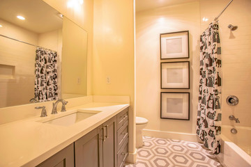 Stylish bathroom interior of a house with geomwtric design on the floor
