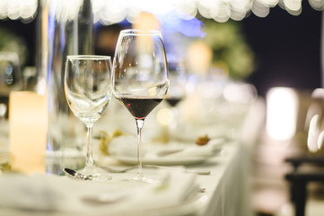 Table setting at a luxury wedding and Beautiful flowers on the table.