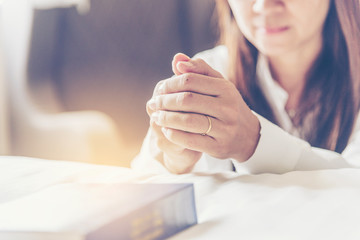 Holy bible prayer believe in god church. Woman hands pray christian bible for god blessing wishing...