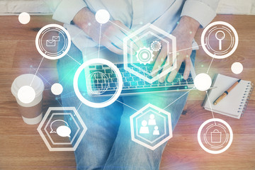 Media network theme hologram with man working on computer on background. Concept of internet...
