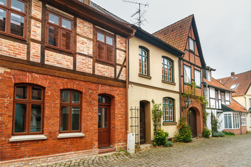 Fototapeta na wymiar Street with Medieval old brick buildings. Luneburg. Germany