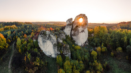 A panoramic view of the unique Okiennik rock in Poland with a large natural window