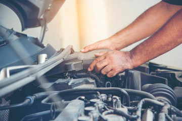 Mechanic Car Service in automobile garage auto car and vehicles service mechanical engineering. Automobile mechanic hands car repairs automotive technician workshop center. Services car engine machine