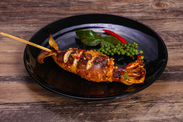 Grilled squid with sauce and hebs