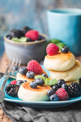 Cottage cheese pancakes with berries. Healthy Breakfast.