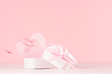 Romance celebration background for Valentine and wedding - cute heart with silk ribbon and gift box...