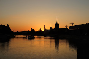 Naklejka premium sunset over the river