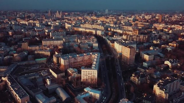 Aerial view of Moscow's cityscape in the rays of the setting spring sun