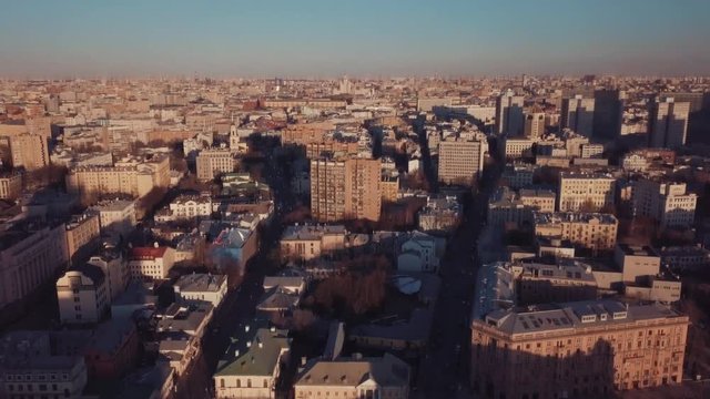 Aerial view of Moscow's cityscape in the rays of the setting spring sun