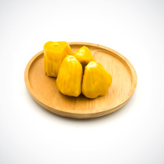 Fruit jackfruit in a wooden plate Isolated on the white background.