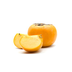 Ripe persimmon isolated on the white background.