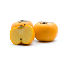 Ripe persimmon isolated on the white background.