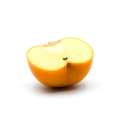 Ripe persimmon isolated on the white background.