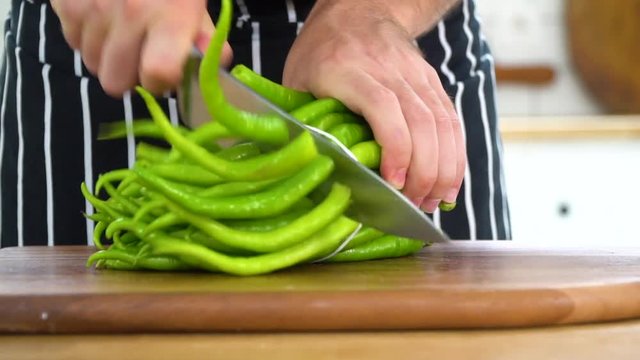 cutting a bouguet of fresh green peppers, ib01