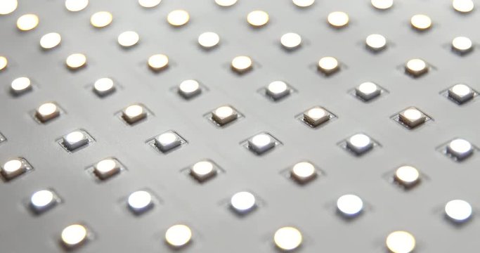 Close up shot of led panel with changing color, camera moving