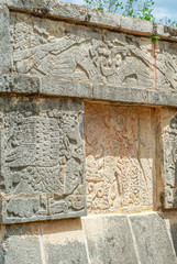 Engraved ornamental stones in the archaeological area of Chichen Itza, on the Yucatan peninsula