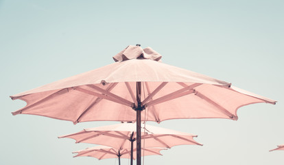 Abstract beach background with beach umbrella