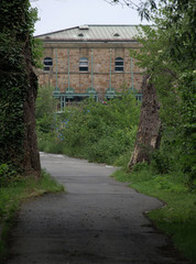empty footpath leading to the water plant "Kahlenberg" in Muelheim
