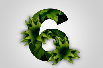 Nature concept. Creative number with green leaves on a gray background. Creative typography,...