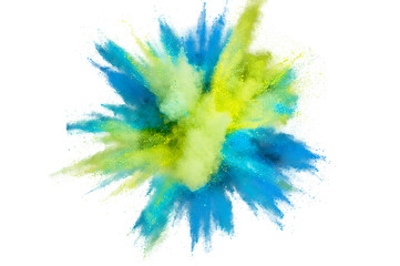 Colored powder explosion on a white background. Abstract closeup dust on backdrop. Colorful...