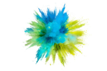 Colored powder explosion on a white background. Abstract closeup dust on backdrop. Colorful...
