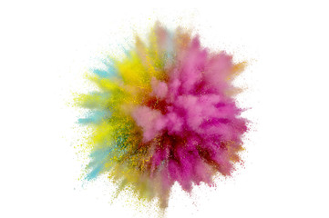 Colored powder explosion on a white background. Abstract closeup dust on backdrop. Colorful...