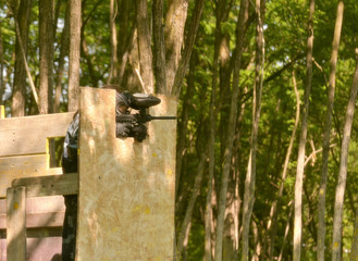 Paintball battle. The battlefield is equipped with turrets