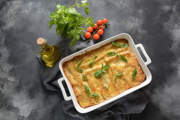 Cannelloni pasta stuffed with spinach, mushrooms,ricotta and sauce bechamel. Italian cuisine. Traditional food for Shavuot Jewish holiday