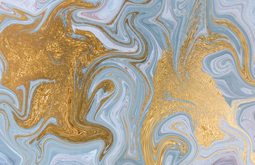 Marble abstract acrylic background. Nature blue marbling artwork texture. Gold glitter.